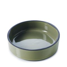 a green and blue bowl on a white background