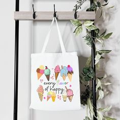 Show off your delicious style with this "Ice Cream Every Flavor of Happy 🍦🌈" tote bag! Featuring a colorful and playful design, this white tote will be your go-to for all of your activities - picnics, festivals, game day, school stuff and Holiday travels! You'll be feeling 'scoops' of happiness" everywhere you go! 🍨 This bag is a perfect way to showcase a bit of your personality! It is practical, stylish and environmentally friendly reusable. We hand press each item with love and care. 💙▸ Di White Novelty School Bags, Novelty White School Bag, White Shoulder Bag Suitable As A Gift For School, Playful White Summer Bag, White Shoulder Bag For School, Cute White Canvas Travel Bag, Cute White Rectangular Canvas Bag, Fun White Bags For Shopping, White Canvas Bag With Letter Print For Shopping