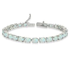 PRICES MAY VARY. Feature - Express your style and elegance with this classic tennis bracelet. This stunning bracelet features dazzling 6x4mm oval-cut gemstones, for a chic and trendy look Crafted - The bracelet is crafted of fine sterling silver. It measures 7.25 inches and secures with a box and tongue with a safety latch Care - Keep from water cosmetics & chemical product. Clean with microfiber cloth Packaging - Jewelry packaged with a nice box ready for gifting About – Our jewelry collection Opal Bangle, Bridesmaid Bracelet Gift, Small Bracelets, Bracelet Display, Birthstone Bracelet, Opal Bracelet, Birthstone Bracelets, Bracelet Sterling Silver, Bride Jewellery