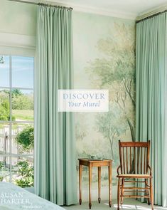 a chair and table sitting in front of a window