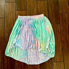 Womans Topshop High Low Multi Colored Pleated Skirt Size 10 Spring Beach Pleated Skirt, Trendy Pleated Beach Skirt, Spring Beach Flared Skort, Flowy Midi Skort For Summer, Casual Midi Skort For Spring, Casual Spring Midi Skort, Casual Multicolor Asymmetrical Maxi Skirt, Trendy Multicolor Tiered Skirt, Green Asymmetrical Skirt For Beach