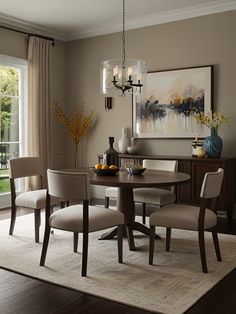 a dining room table with four chairs and a vase on top of it in front of a window