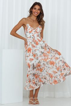 Length from bust to hem of size S: 111cm. Orange floral printed midi dress. Lined. Cold hand wash only. Model is a standard XS and is wearing size XS. True to size. Lightweight, non-stretchy chiffon fabric. Back zipper. Adjustable shoulder strap. Polyester. Slide On In to this fab fit. Florals are SO in this season, so this dress is ideal for all of your needs. This fun midi has a cute sweetheart neckline and a long flowy skirt. PERF with strappy heels and a gold necklace. Long Flowy Skirt, Dress Orange, Slide On, Flowy Skirt, Printed Midi Dress, Chiffon Fabric, Strappy Heels, Floral Printed, Sweetheart Neckline