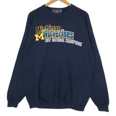 Vintage 90s University Of Michigan Wolverines crewneck sweatshirt in navy blue colour. Pullover sweater with printed graphic on both side. Still in good condition. SEE THE PICTURES FOR MORE DETAILS. CONDITION : 9/10 MEASUREMENT Pit : 23 inch Length : 30 inch Shoulder : 24 inch Arm Length : 25.5 inch Size On Tag : L Recommended Size : L PAYMENT We accept PayPal only. The item will be ship 3-5 days once the payment has been made. NORMAL SHIPPING FEDEX USUALLY AROUND 7-21 DAYS BEFORE REACH THE DEST Winter Fan Apparel Crew Sweater, Winter Crew-neck Fan Apparel Sweater, College Crew Sweater With Logo Print, Fall Crew Sweatshirt For Fan Merchandise, Navy Sporty Sweatshirt With Graphic Print, 90s Style Long Sleeve Sweatshirt Fan Merchandise, Sporty Navy Sweatshirt With Graphic Print, Navy Crew Neck Sweatshirt With Logo Print, Navy Crew Neck Sweatshirt With Logo