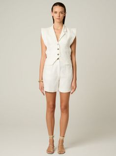 Crafted from 100% linen, our Nina Vest offers timeless sophistication and breathability.  It has a 3 button closure and is fitted at the waist to create a flattering silhouette.  Pair it with the Ella shorts for a full set look or with jeans and sandals for a laid back vibe. Fabric: 100% Linen - Oeko Tex Certified Care:  Machine Wash Cold (Gentle Cycle) or Dry Clean Fit:  True to Size Black Set, Long Legs, Dusty Blue, Full Set, Skirt Pants, Dress Skirt, Jumpsuit Romper, 404 Not Found, Rompers