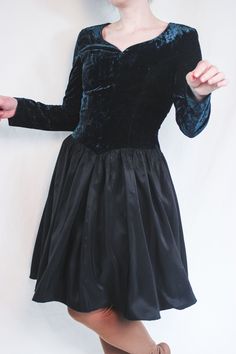 "Very beautiful vintage black taffeta and petro blue viscose velvet dress by Vera Mont. Very glossy type viscose velvet. Elegant pointed princess waist No stretch in fabric Back zipper Good vintage condition, no visible flaws. Ready to wear. ● Era : 80s/ early 90s ● Label : Vera Mont ● Fabric : 59% viscose, 41 % v cotton. Lining 100% acetate ● Size : approx M/ EU 38, fitted cut, no stretch in fabric. ● Fit : fitted upper part, no stretch, loose and very flared bottom skirt part. Zips up in the b Velvet Evening Dress For Halloween, Halloween Velvet Party Dress, Gothic Velvet Dress For Costume Party, Vintage Dresses For Fall Cosplay, Vintage Dress For Fall Costume Party, Gothic Velvet Dress For Fall, Fall Vintage Dress For Costume Party, Fitted Vintage Dress For Fall Costume Party, Long Sleeve Velvet Halloween Dress