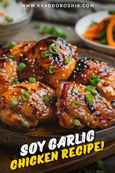 chicken wings with sesame seeds and green onions served on a platter text says soy garlic chicken recipe