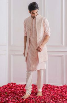 Editor's Note Featuring A Contemporary Front Open Lucknowi Powder Pink Nehru Jacket With Delicate Thread And Sequence Embroidery. Perfect For The Mehndi/haldi Occasion. This Comes With A Powder Pink Panelled Kurta. Color: Pink Fabric: Pure Georgette & Cotton Silk Care: Dry Clean Only About the Designer Ankit V Kapoor is a clothing brand that amalgamates traditional Indian handicrafts and bespoke tailoring. Inspired by the heritage of India and unified with revolutionary thoughts. Specialize in M Men Outfit For Sisters Wedding Indian, Lucknowi Mens Kurta, Brother Dress For Sister Wedding, Lucknowi Kurta For Men Wedding, Lucknowi Kurta For Men, Nehru Jacket With Kurta, Brother Wedding