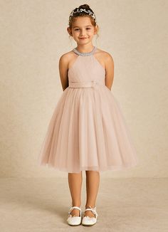 Honey is the perfect knee length dress for your sweet little girl. Cut from tulle, she features a pearl halter neckline, a pleated bodice, a scoop back, a ruched A-line skirt, and a beautiful beaded flower over her satin belt. Honey Flower, Satin Belt, Tulle Flower Girl, Flower Girl Dresses Tulle, Feel Like A Princess, Pleated Bodice, English Rose, Dress Flower, English Roses