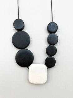 Neclace in Black and White/ Minimal Necklace/ Wooden and Clay | Etsy Modern White Adjustable Necklace, Everyday White Necklaces With Wooden Beads, Elegant White Resin Necklace, White Round Resin Necklaces, White Resin Round Necklaces, White Jewelry With Wooden Beads, White Jewelry With Round Wooden Beads, Modern White Necklaces For Everyday, Minimalist Wooden Beads Jewelry Gift