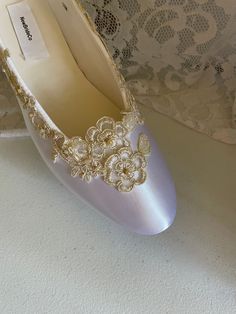 These shoes' are trimmed with a beautiful hand embroidered Champagne/gold embroidered color lace appliqués: have sequins and champagne color pearls, there's a gold threading that enhances this elegant shoes. Inner sole is soft man-made material, outer sole is leather. US Sizes: 5 to 10 (half sizes available) ; And *11 &12 SHOES RUN TRUE TO SIZE US Size: 6w, 6.5w, 7w, 7.5w, 8w, 8.5w, 9w, 9.5w, 10w and *11W & 12W please read below *And *11&12 for an additional cost of $15.00 COLORS: Wh Formal Embroidered Wedding Shoes With Round Toe, Elegant Embroidered Wedding Shoes For Evening, Elegant Wedding Shoes With Gold Embroidery For Party, Elegant Embroidered Wedding Shoes For Party, Elegant Wedding Shoes With Gold Embroidery For Reception, Gold Almond Toe Wedding Shoes, Formal Embroidered Pointed Toe Wedding Shoes, Fitted Champagne Closed Toe Wedding Shoes, Elegant Gold Embroidery Wedding Shoes For Party