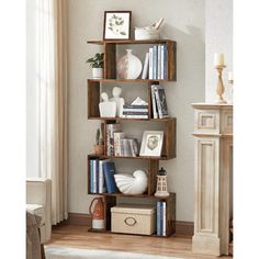 a book shelf filled with books in a living room next to a fire place and window