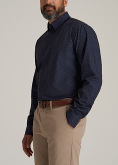 About Our Extra-Long Men's Shirt Reliable and versatile, you can wear this traveler shirt for tall men on any trip, to any meeting, with any outfit. Made of a polyester and spandex blend, it's as comfortable as your favorite tee with the class of a formal dress shirt. It has just the right amount of stretch so you can take it anywhere, whether you're catching flights or taking a big meeting in the boardroom. You want to feel confident in the fit and style of your clothes, which can be hard if yo Casual Navy Long Sleeve Dress Shirt, Casual Navy Dress Shirt For Work, Navy Casual Shirt For Business, Formal Dress Shirt, Catching Flights, Scrubs Dress, Cozy Sleepwear, Tall Dress, Formal Shirt Dress