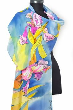 Luxury Silk Scarf. Orchids in blue, rose and yellow. Hand painted silk shawl.  Luxury silk shawl. Painting flowers.  This silk scarf is painted on fine 100% pure silk , and is hand hemmed. Luxury silk gift for woman. Beautiful shawl for summer,autumn and winter!  Luxury gift for every solution.  dimensions -20 by 78 inches=50 by 200 cm -------------------------------------------------------------------------- This hand painted silk scarf I created is the only one on this planet. I never use guid Blue Silk Scarves For Spring, Multicolor Silk Floral Print Shawl, Multicolor Silk Shawl With Floral Print, Artistic Blue Silk Scarf For Spring, Artistic Silk Scarves With Floral Print, Blue Hand Painted Silk Scarf, Multicolor Hand Painted Silk Scarves, Artistic Multicolor Silk Scarf With Floral Print, Artistic Multicolor Floral Print Silk Scarf