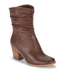 The right pair of boots can really take an outfit to the next level. Our Leslie 3/4 height boot is a great compliment to your favorite jeans or a dress. Featuring a leather stacked heel, manmade leather upper and stylish rouching at the top of the boot. Casual Leather Mid-calf Boots With Stacked Heel, Casual Moto Boots With Stacked Heel For Fall, Casual Moto Boots With Stacked Heel For Spring, Casual Boots With Stacked Heel For Fall, Casual Mid-calf Boots With Stacked Heel, Casual Mid-calf Boots With Stacked Heel And Wide Calf, Casual Mid-calf Boots With Stacked Heel For Wide Calves, Casual Fitted Mid-calf Boots With Stacked Heel, Spring Brown Lace-up Boots With Reinforced Heel