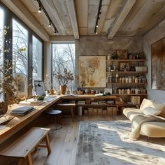 a living room filled with furniture and lots of windows