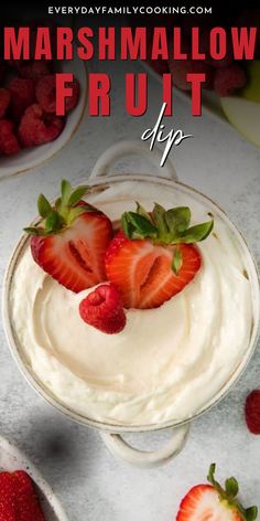 there are strawberries on top of the dessert in this bowl with text overlay that reads, marshmallow fruit dip