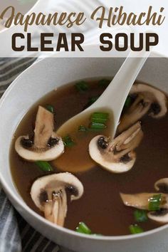 a close up of a bowl of soup with mushrooms