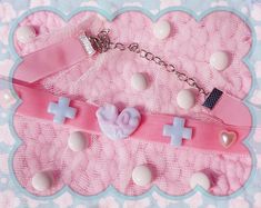 "🏥 💉 💊 In \"Beary Cute Hospital\" we treat our patients with love and care. Surrounded by skilled nurses and doctors, they can get well very soon. 💖 🐻 😃 Check what option is linked to what choker- pink and blue regard RIBBON! The chokers are 29-30cm long plus 10-12cm chain for regulation. Base is a velvet ribbon, if you want to switch to satin ribbon please let me know. Velvet ribbon is more sturdy so I would recommend keeping it. I also have red, light purple, yellow and black ribbon avai Pink Harajuku Style Jewelry Gift, Pink Heart Choker As Gift, Pink Heart-shaped Choker As A Gift, Pink Heart-shaped Choker For Gifts, Pink Heart-shaped Choker Gift, Handmade Harajuku Jewelry, Handmade White Harajuku Jewelry, Harajuku Style Handmade White Jewelry, Handmade Pink Harajuku Style Necklace