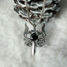 Dragon and Sword Silver Necklace , 925K Silver Black Round Zircon Stone Pendant , Legendary Monster Theme , Prehistoric Animal Necklace , Gift For Him , Gift For Her , Free Express Shipping ✓ PRODUCT FEATURES : ✧ Handmade Item ✧ Materials: 925 Sterling Silver ✧ We send it together with a Cebeci Silver gift box, a silver cleaning cloth and a surprise gift. ✧ Pendant Weight : 6,5 Grams ✧ Chain Length & Weight: 18 Inch - ( 45 cm ) = 5.60 Gram 20 Inch - ( 50 cm ) = 5.85 Gram 22 Inch - ( 55 cm ) = 6. Medieval Black Jewelry For Fantasy Events, Black Sterling Silver Fantasy Jewelry, Black Medieval Pendant Jewelry, Medieval Black Pendant Jewelry, Black Jewelry With Dragon Design Collectible, Collectible Black Jewelry With Dragon Design, Black Warrior Style Jewelry As Gift, Black Warrior Style Jewelry For Gift, Legendary Monsters