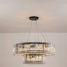 a chandelier hanging from the ceiling in a room