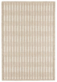 a beige rug with white stripes on it