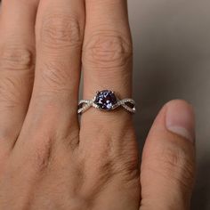 This is a gorgeous handmade creation. Its beauty is its simplicity & Elegance. The 7*7 mm round shape faceted lab Alexandrite is crafted in solid sterling silver and with rhodium plated. All item is sent in a beautiful gift box If you have any idea of design your ring,pls contact me directly. You can realize more lovely stuff clicking the link https://www.etsy.com/shop/knightjewelry?refshopsection_shophome_leftnav Please leave the correct address and you phone number for delivering successfu Elegant Sterling Silver Birthstone Ring With Center Stone, Modern Twist Jewelry With Prong Setting For Anniversary, Elegant Amethyst Ring With Center Stone, Dazzling Crystal Ring With Accent Stones, White Gold Crystal Ring With Accent Stones, Round Crystal Promise Ring With Accent Stones, Sterling Silver Diamond Ring With Accent Stones, Round Crystal Ring With Accent Stones For Promise, Sterling Silver Birthstone Ring With Round Stone