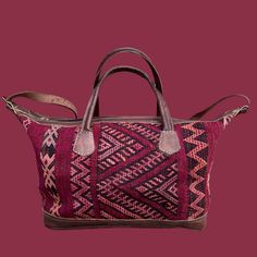 You're going to want to plan a weekend trip just so you can use this beautiful bag! Intertwined's beautifully crafted travel bag is handmade in Morocco from locally tanned leather and vintage, handwoven kilim. Each kilim is one-of-a-kind and handwoven with unique colors and patterns based on the region where it is made. Traditional Rectangular Weekender Bag For Travel, Woven Satchel With Double Handle For Travel, Travel Satchel With Double Handle And Woven Detail, Traditional Tote Travel Bag With Leather Handles, Travel Woven Satchel, Bohemian Rectangular Bag For Overnight Trips, Traditional Travel Bags With Leather Handles, Traditional Travel Tote Bag With Leather Handles, Traditional Tote Weekender Bag For Travel