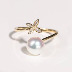 Akoya Pearl Rose Gold Butterfly Ring, Japan Pearl And Diamond Ring, Vintage Real Pearl Ring, Ivory Pearl, Pinkish Pearl, Dainty Promise Ring ✦PRODUCT DETAILS✦ → Main stone: Akoya Pearl 7.5-8.0mm → Side stone: Diamond 0.026ct ✦SPECIFICATIONS✦ MOISSANITE ✓ COLOR: D ✓ CLARITY: VVS1 ✓ CUT: EXCELLENT OR DIAMOND ✓ COLOR: F-G ✓ CLARITY: SI1-VS ABOUT US ♥ Our designer and craftsmen work to create and deliver the most refined pieces of jewelry to you. We carefully handpicked and sourced each gemstone to Fine Jewelry White Pearl Ring Gift, White Open Flower Ring For Formal Occasions, Delicate White Flower Ring For Wedding, Elegant White Flower Ring For Wedding, Fine Jewelry White Pearl Open Ring, White Pearl Open Ring Fine Jewelry, Fine Jewelry White Flower Ring, Elegant White Flower Open Ring, Elegant White Open Flower Ring