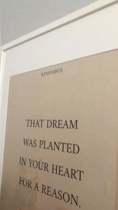 a sign on the wall that says, that dream was planted in your heart for a reason