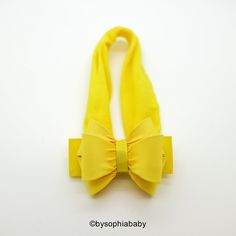 "YELLOW BABY BOW HEADBAND --->> MANY COLORS AVAILABLE <<--- Please see link: https://www.etsy.com/shop/BySophiaBaby?ref=seller-platform-mcnav&search_query=1699 --->> FREE SHIPPING <<-- When you spend $50 in our shop, please see code on our shop announcement. *BOW HEADBAND DESCRIPTION*: - Unique Handcraft Triple Bow placed on a 1.5\" stretchy Headband. Bow measure approx. 2.5\"X 2.0\" - Bow is made of fabric and grosgrain, it's very light & headband holds very well Adjustable Yellow Headband For Gift, Adjustable Yellow Headband As Gift, Adjustable Yellow Headband Gift, Baby Hair Bow, Yellow Bow, Headband Bow, Yellow Baby, Baby Bow Headband, Newborn Headband