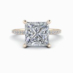 This stunning Zayla No. 1 Lab Grown Diamond Ring features a 3.00 ct. princess cut center stone, providing a timeless and elegant look. Crafted with quality and precision, it is a beautiful addition to any jewelry collection. Perfect for those looking for a sustainable and ethical diamond option. Center Stone: IGI Certified 3.00 ct. Princess Cut Lab Grown Diamond, G Color, VS2 Clarity. Setting: Round lab grown diamonds, GH Color, SI1 Clarity, .20 ct. Band width: 1.7mm 3.20 Carat Total Weight 📏Or Elegant Square Cut Solitaire Diamond Ring, Luxury Princess Cut Solitaire Jewelry, 14k Yellow Gold Square Cut Diamond Ring, Gia Certified Gold Princess Cut Diamond Ring, Gia Certified Luxury Square Cut Diamond Ring, Gold Moissanite Square Cut Ring, Gold Square Cut Moissanite Ring, Gia Certified Elegant Square Cut Diamond Ring, Gold Gia Certified Diamond Ring With Asscher Cut