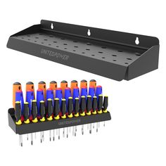 an assortment of multicolored screwdrivers are shown in this image and on the shelf