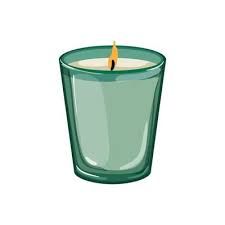 a green glass filled with a burning candle