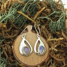 This beautiful pair of Sterling Silver (.925) earrings features Rainbow Moonstone cabochons.  Each earring measures 22.3 x 12.9 x 5.3mm (drop length 35.5) and the pair weighs 4.04 grams total Please make sure to view all photos and descriptions of items before making a purchase.  If you have any questions at all please feel free to message us before making your purchase.  We do not accept any returns or exchanges.  Thank you! JW001 Sterling Silver Cabochon Drop Jewelry, Teardrop Cabochon Earrings For Anniversary, Sterling Silver Teardrop Cabochon Earrings, Silver Teardrop Cabochon Earrings, Silver Cabochon Teardrop Earrings, Silver Cabochon Dangle Earrings, Pierced Teardrop Moonstone Earrings, Sterling Silver Cabochon Drop Earrings, Pierced Oval Teardrop Earrings For Gifts