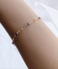 * DETAILS* - AAA+ Burma Blue Sapphire Faceted Beads 2mm - 14k Gold Filled Chain - 14k Gold Filled Spring Ring Clasp ✨ All components are 14k Gold Filled. 👉🏻 How to measure 1. Use a string to mark the spot you would like your bracelet. (⭐️remember to add some space for a loose fit) 2. Lay the string flat and measure the string's length with a ruler to get your final length. 👉🏻 You may also like the matching necklace. Please check here. https://www.etsy.com/JinnysJewelryBySeJin/listing/8715687 Delicate Blue Bracelets For Everyday, Gift 14k Gold Filled Bracelets With Adjustable Chain, Gift Bracelets With Adjustable Chain In 14k Gold Filled, Dainty Gemstone 14k Gold Filled Bracelets, Dainty Crystal Bracelet With Adjustable Chain, Blue Dainty Birthstone Bracelets, 14k Gold Filled Bangle Bracelet Gift, Delicate Beaded Bracelet With Adjustable Chain For Gift, Dainty Jubilee Crystal Bracelet As Gift