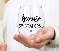 a person holding a wine glass with the words because virtual teaching