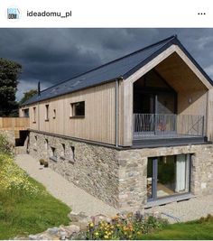 the house is made out of stone and has a metal roof on it's side