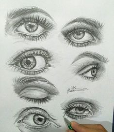 someone is drawing different types of eyes