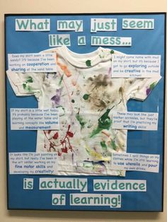 a bulletin board with an image of a t - shirt that has been altered to read what may just seem like a mess is actually evidence of learning