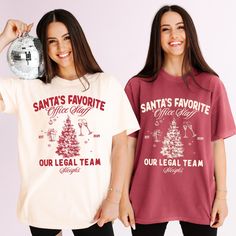 Celebrate the holiday season with custom Christmas Party Shirts. Get into the festive spirit with our Our Santa's Favorite Office Staff shirts, perfect for office parties and group celebrations. Explore our unique Christmas party ideas and make this year's office party unforgettable with matching team shirts. *Price is per individual shirt. Free shipping for orders over $35, available only to customers in the USA. 🌟 𝗖𝗼𝗹𝗹𝗲𝗰𝘁𝗶𝗼𝗻: https://www.etsy.com/shop/PeachyBash?section_id=51390582 🔰 𝗔𝗱𝗱 𝗧𝗲𝘅𝘁 𝗼𝗻 𝘁𝗵𝗲 𝗕𝗮𝗰𝗸 𝗼𝗿 𝗙𝗿𝗼𝗻𝘁: https://www.etsy.com/listing/1708643719/ --- 📌 𝗦𝘁𝗲𝗽-𝗯𝘆-𝗦𝘁𝗲𝗽 𝗚𝘂𝗶𝗱𝗲 𝘁𝗼 𝗣𝗹𝗮𝗰𝗶𝗻𝗴 𝗬𝗼𝘂𝗿 𝗢𝗿𝗱𝗲𝗿 1️⃣ 𝗖𝗵𝗼𝗼𝘀𝗲 𝗬𝗼𝘂𝗿 𝗦𝗵𝗶𝗿𝘁: Pick the size and color. 2️⃣ 𝗣𝗲𝗿𝘀𝗼𝗻𝗮𝗹𝗶𝘇𝗮𝘁𝗶𝗼𝗻: In the 'Add your perso Office Christmas Shirts, Team Santa Shirt, Office Staff Shirts, Staff Shirts, Work Christmas Party, Christmas Party Shirts, Office Staff, Group Shirts, Office Christmas