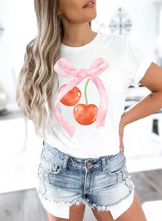 Indulge in sweet style with our Cherry Bliss T-shirt - a delightful fusion of playful charm and fruity flair! This eye-catching tee showcases a stylish bow paired with luscious cherries, creating a fun and vibrant design that's perfect for adding a pop of color to your wardrobe. Crafted from soft and breathable fabric, this tee ensures comfort without compromising on style. Whether you're headed to a summer picnic or just want to infuse your everyday look with a touch of whimsy, our Cherry Bliss T-shirt is the ideal choice. Embrace the fruity fun, and make a bold fashion statement with this uniquely designed tee that celebrates the sweetness of style. Grab yours now and let your wardrobe blossom with the joy of cherries and chicness! ❤ Gildan 2000 T-Shirt ❤ Made with 100% COTTON ❤ Wash and Sweet White Tops With Strawberry Print, Cute White Tops With Fruit Design, Cute Tops For Spring Brunch, Trendy Spring Tops With Strawberry Print, Sweet Crew Neck Top For Spring, Cute White Fruit Design Tops, Cute White Top With Cherry Print, Cute Strawberry Print Tops For Spring, Cute Pink Tops For Brunch