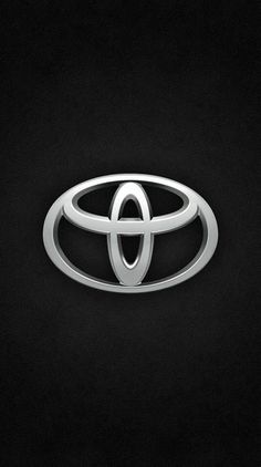 the toyota logo is shown in this black and white photo, it appears to be an emblem