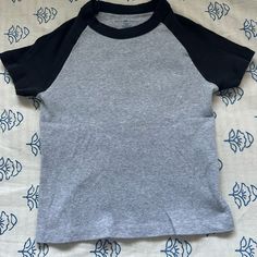 Never Worn, In Perfect Condition! One Size But Fits Xs,S,M Sporty Gray Top With Raglan Sleeves, Black Unisex Short Sleeve Tops, Basic Unisex Black Tops, Basic Black Unisex Tops, People Shopping, Gingham Tops, Tie Front Cardigan, Crochet Shirt, Brandy Melville Tops