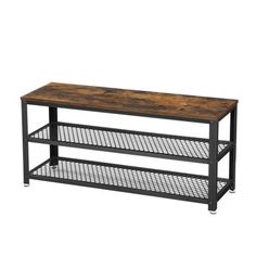 an industrial style coffee table with metal mesh shelves