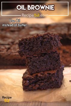 two chocolate brownies stacked on top of each other with the words oil brownie recipe below