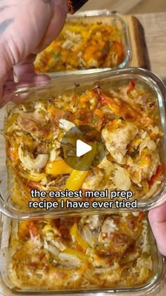 two plastic containers filled with food on top of a wooden table next to a person's hand