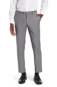 Grey sharkskin printed wool blend suit separates pants bring polished, professional style to your wardrobe. Zip fly with button tab closure Four-pocket style Flat front Woven construction Hemmed 52% wool, 45% recycled polyester, 3% Lycra® spandex Machine wash, line dry Imported Model stats: 6'1" height, 32" waist. Flat Front Dress Pants With Welt Pockets, Business Work Pants With Welt Pockets And Flat Front, Fitted Tommy Hilfiger Bottoms With Pockets, Fitted Work Pants With Pockets For Business, Tommy Hilfiger Fitted Tapered Leg Bottoms, Tommy Hilfiger Classic Tapered Leg Pants, Business Slim Fit Dress Pants With Pockets, Fitted Tommy Hilfiger Pants With Pockets, Fitted Tommy Hilfiger Pants