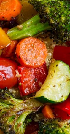 broccoli, carrots, and other vegetables are mixed together in a dish