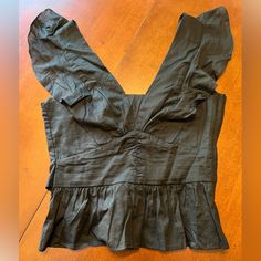 Nwt H&M Black Ruffle Crop Top. Fabric Is A Looks And Feels Like Linen. Very Light Weight. Top Is Double Lined Except For Ruffles At Shoulder & Midriff. Tie Back & Zips Up One Side. H&m Summer Blouse For Night Out, H&m Summer Night Out Blouse, H&m Ruffled Blouse, H&m Tops For Summer Night Out, H&m Tops For Night Out In Summer, Fitted Ruffle Blouse From H&m, Fitted Ruffled Blouse By H&m, Fitted Ruffle Blouse H&m, Elegant Ruffled Top From H&m